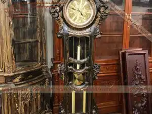 Đồng hồ cây anh hùng tương ngộ gỗ mun hoa