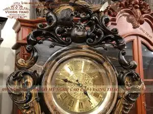 đồng hồ cây chim ưng gỗ mun