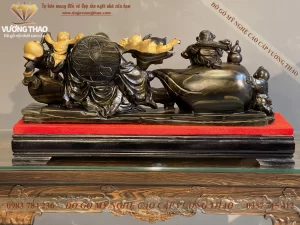 tượng phật di lặc kéo bao gỗ mun hoa (1987)