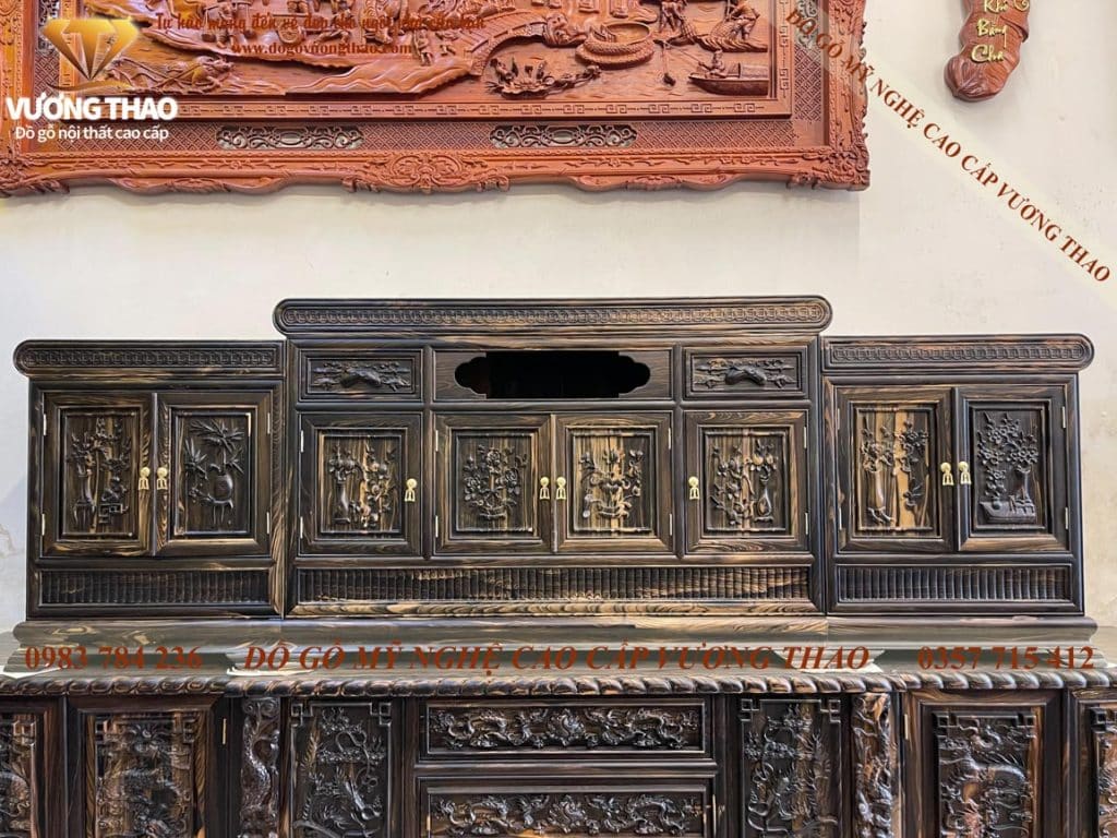 Kệ Tivi mõ đồng tiền gỗ Mun hoa