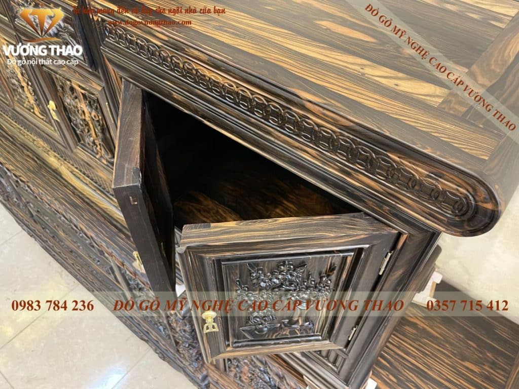 Kệ Tivi mõ đồng tiền gỗ Mun hoa