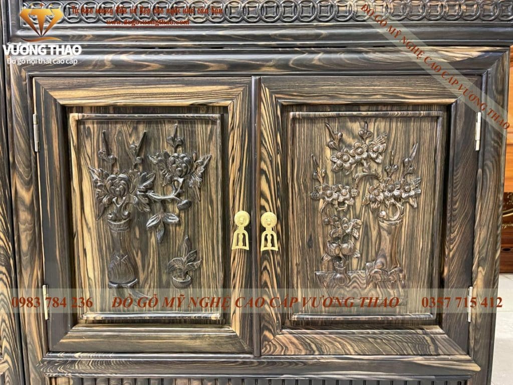 Kệ Tivi mõ đồng tiền gỗ Mun hoa