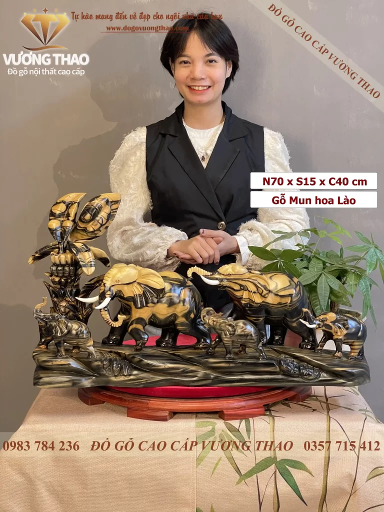 tượng gia đình voi gỗ mun hoa (1684)